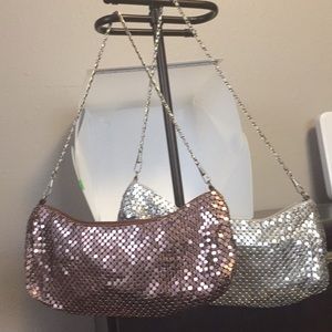 Two metallic mini handbags
